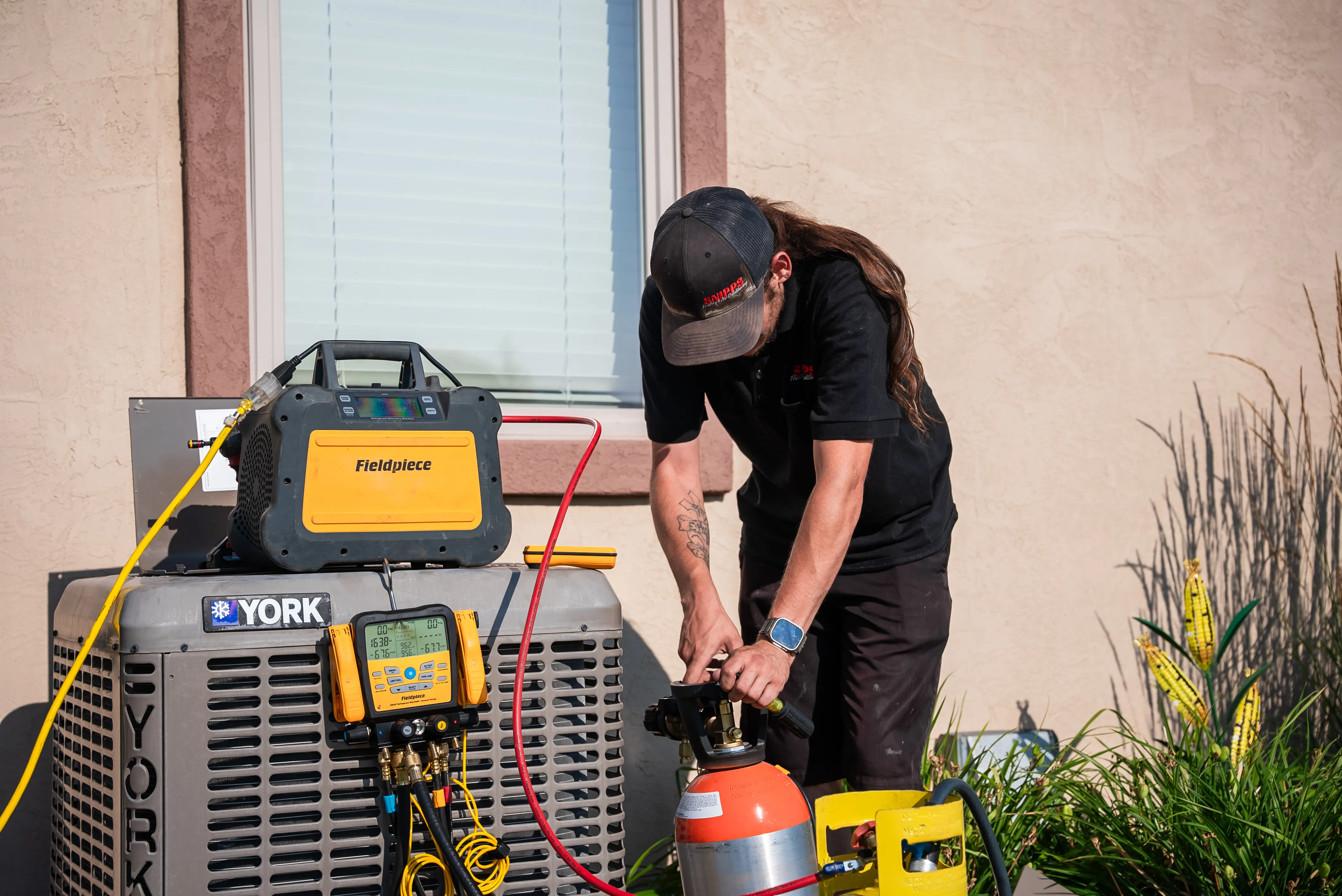 Indoor HVAC equipment and thermostat in a Montrose-area home