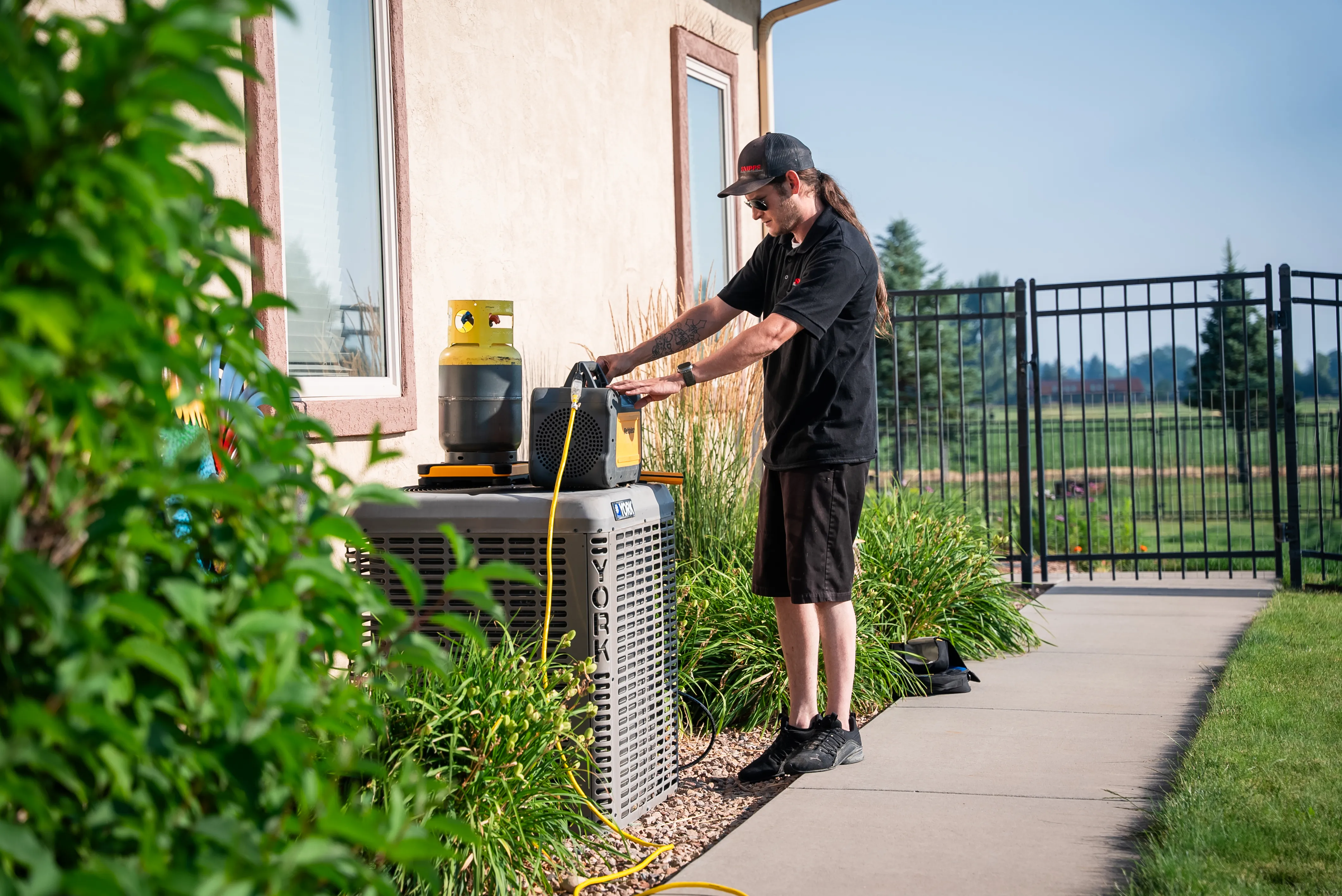 Indoor HVAC equipment and thermostat in a Montrose-area home