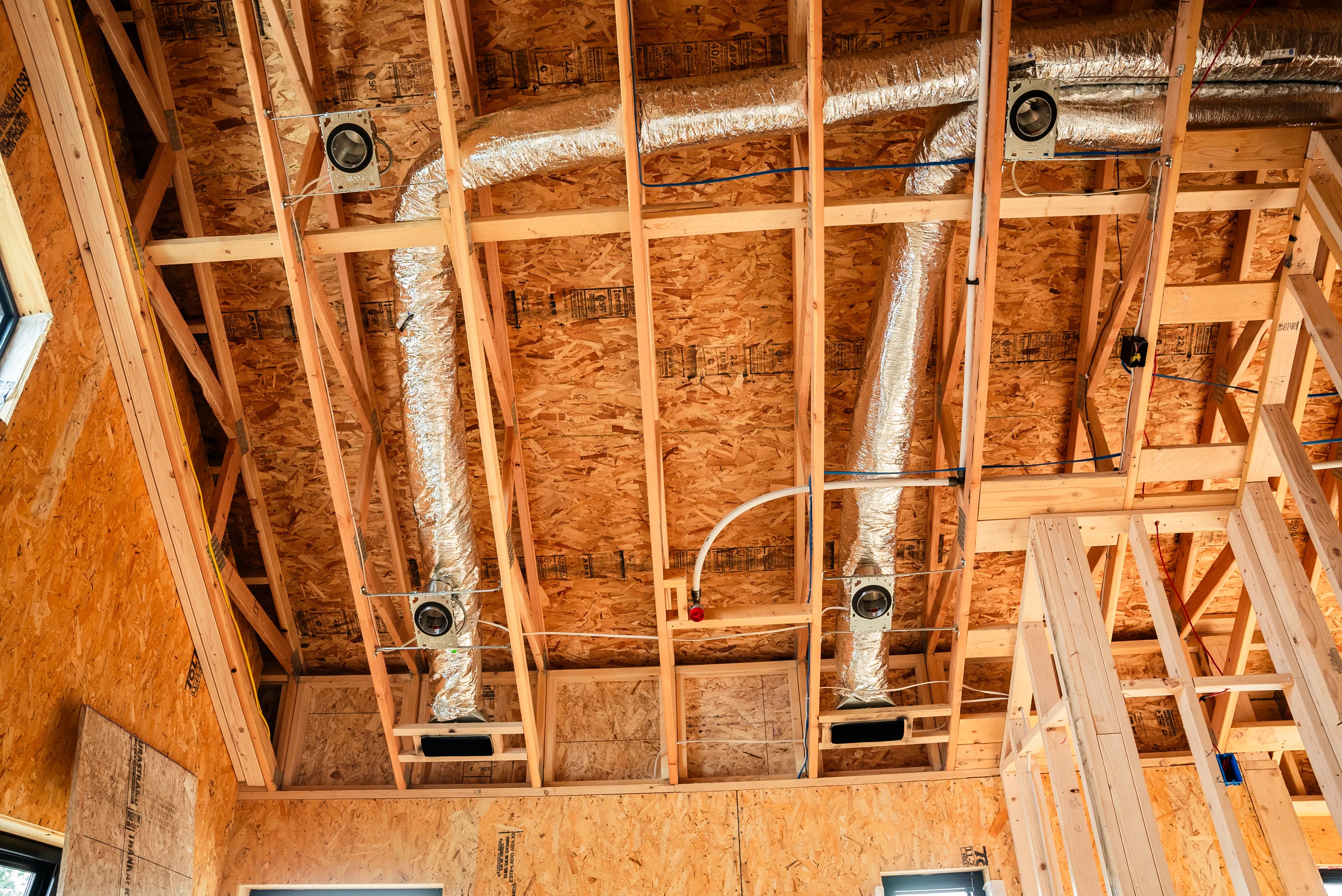 HVAC technician performing maintenance on residential equipment in Montrose, CO