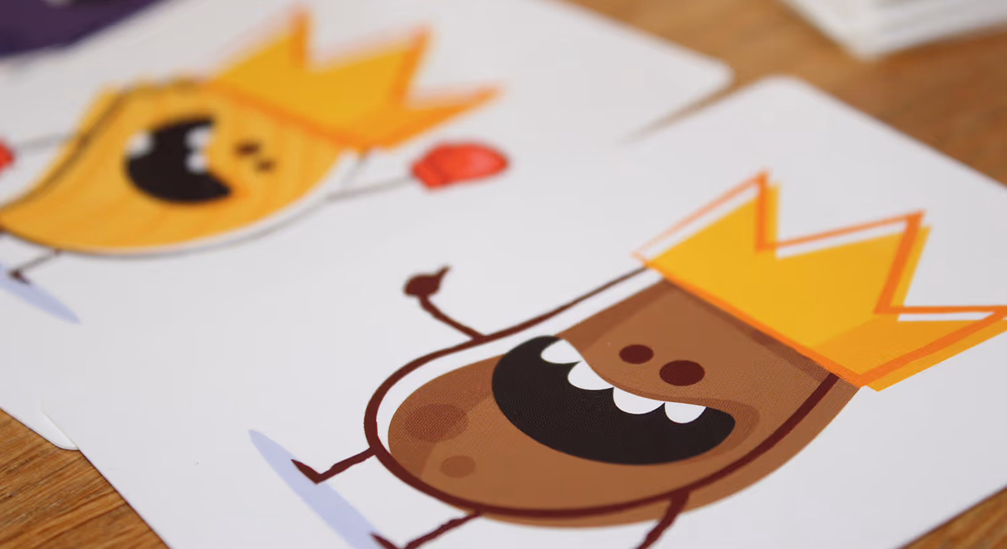 Cartes du jeu Because Potatoes : des patates couronnées portant des gants de boxe
