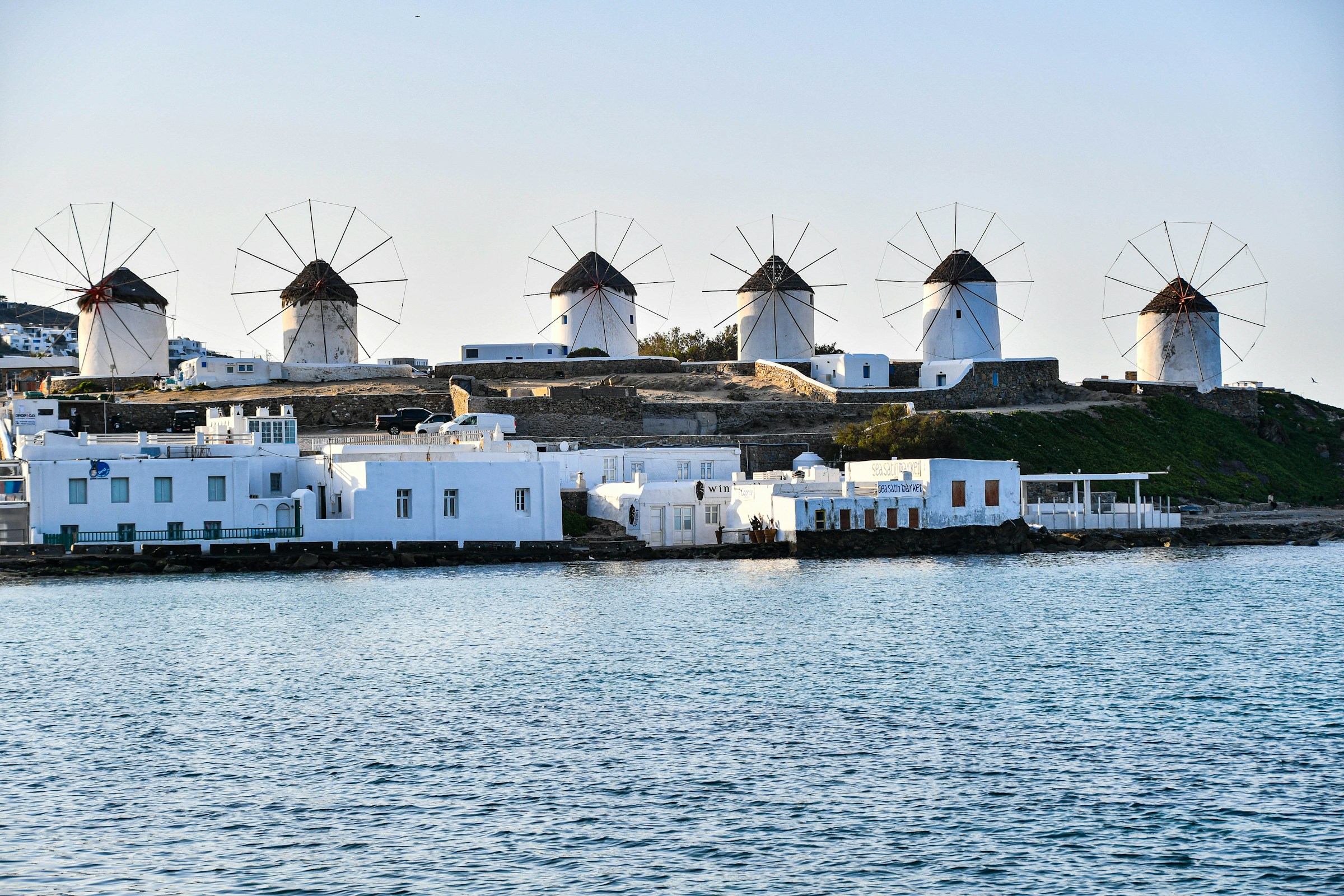 The Kato Mili windmills on the hill above the Aegean sea, Mykonos