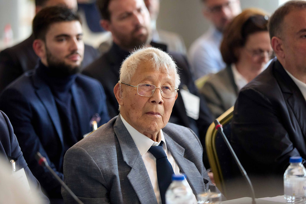Delegate listening during a session, Chios 2026