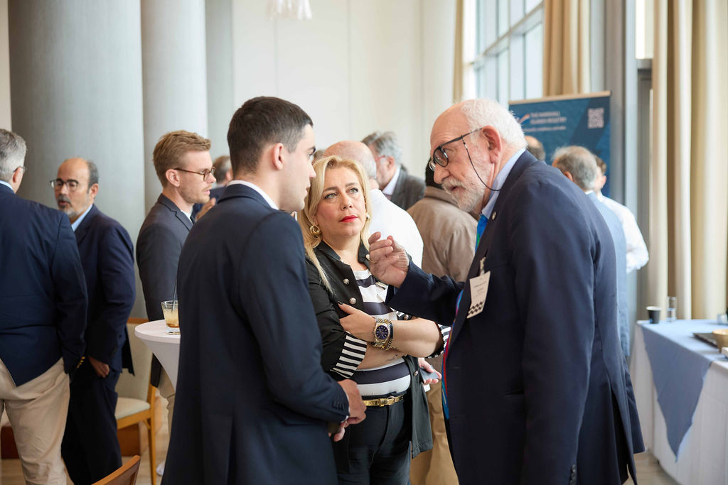 Delegates networking between sessions, Chios 2026