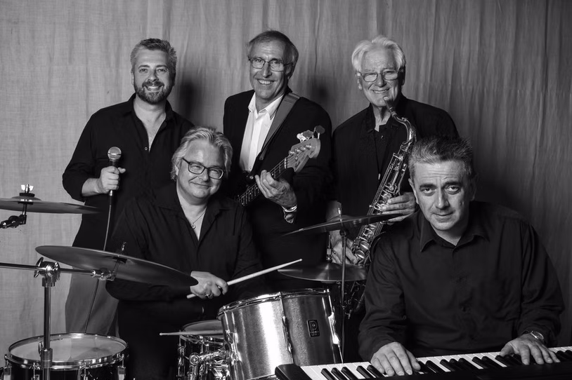 The Lee Ingram Quartet photographed with their instruments.