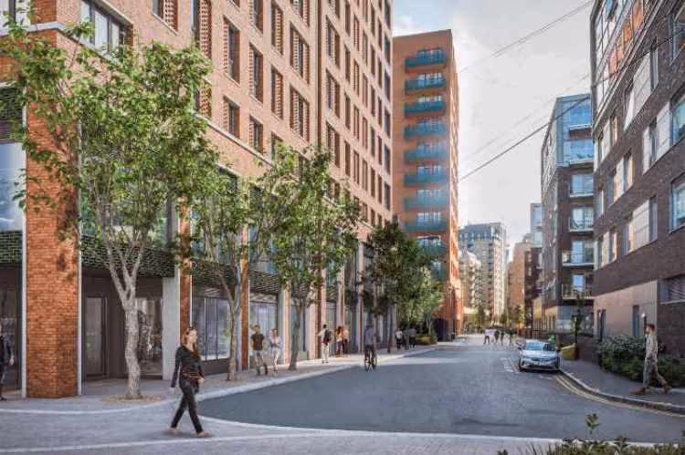 Urban street scene with brick buildings, trees, pedestrians, a cyclist, and a parked silver car.