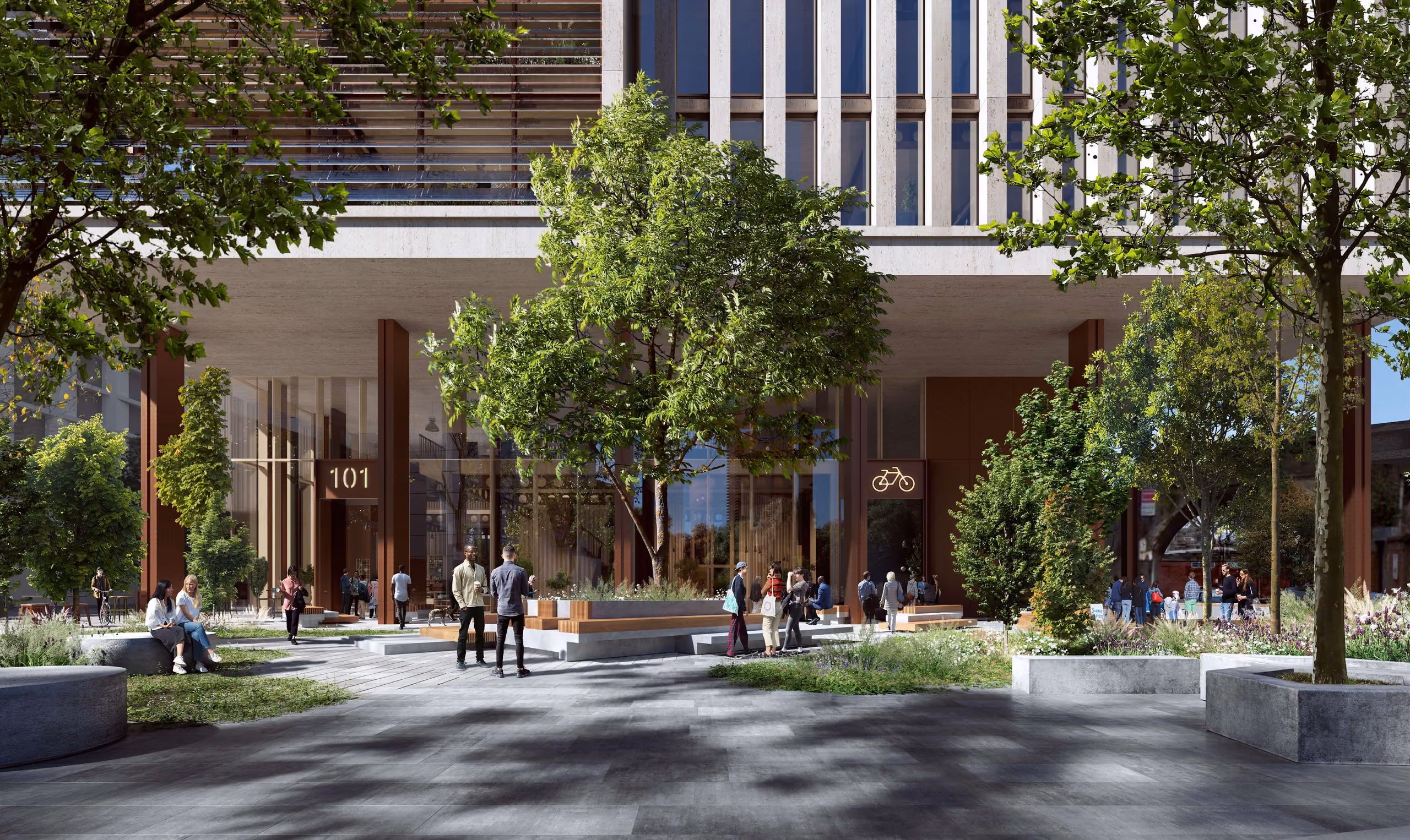 Modern building entrance with trees, people walking and sitting, and bike parking sign visible.