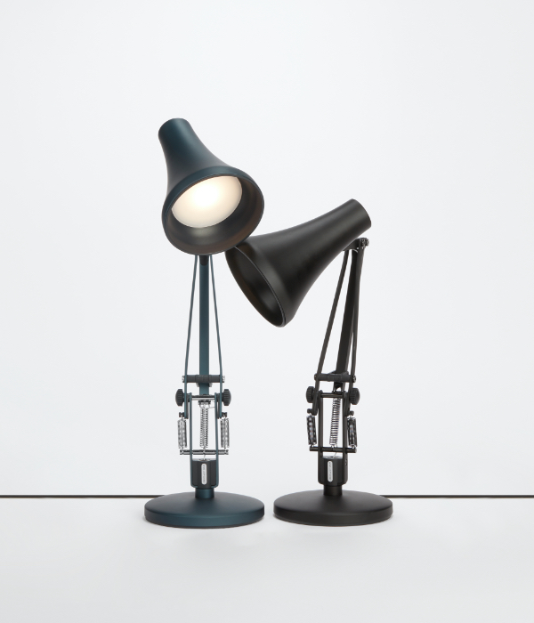 Two Anglepoise lamps on light grey background