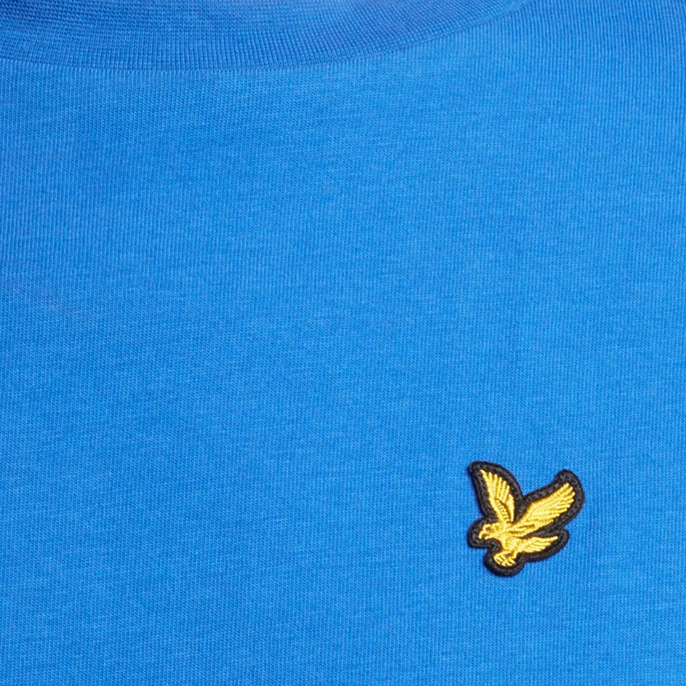 Blue Lyle and Scott graphic t-shirt with the logo in focus - eCommerce photography