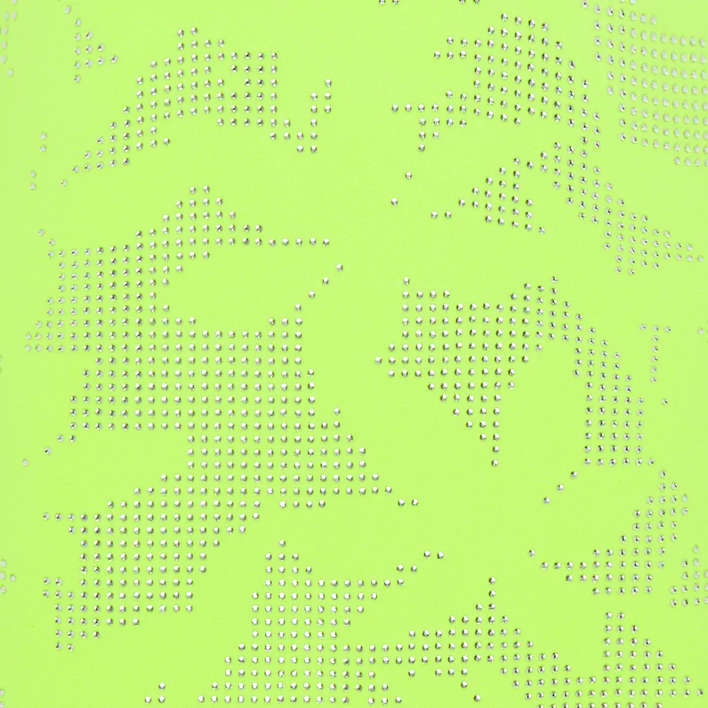 Vibrant green floral texture of a David Koma product - eCommerce photography