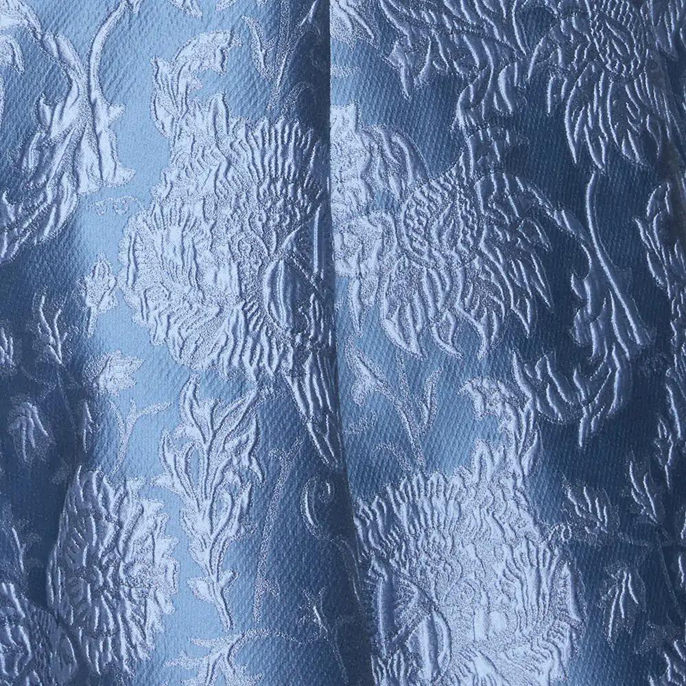 Macro photography of detailed embroidery of an Emilia Wickstead dress