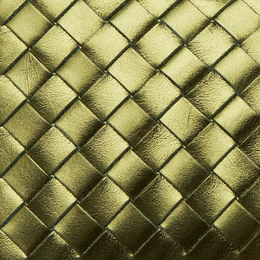 Metallic green and gold texture from an Aspinal of London product