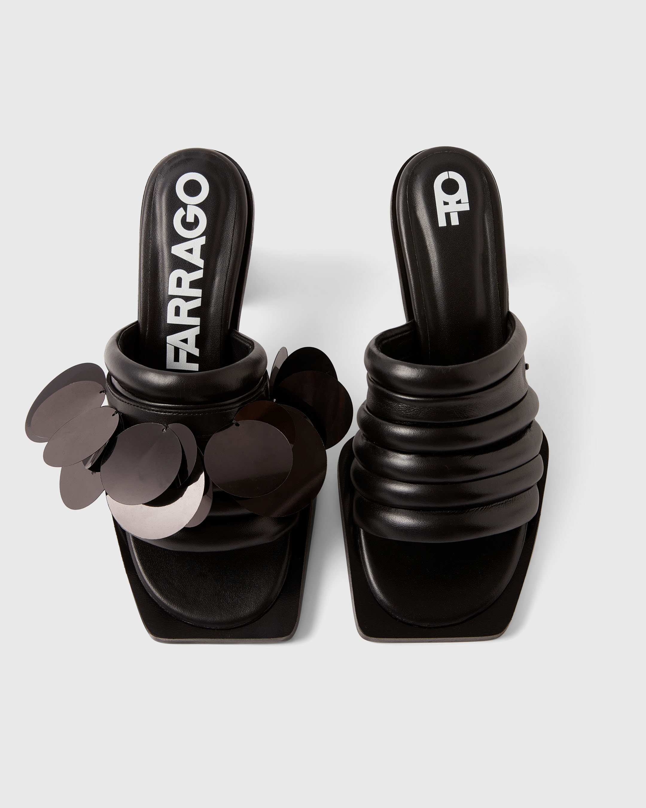 Product photography of a black pair of Farrago mules