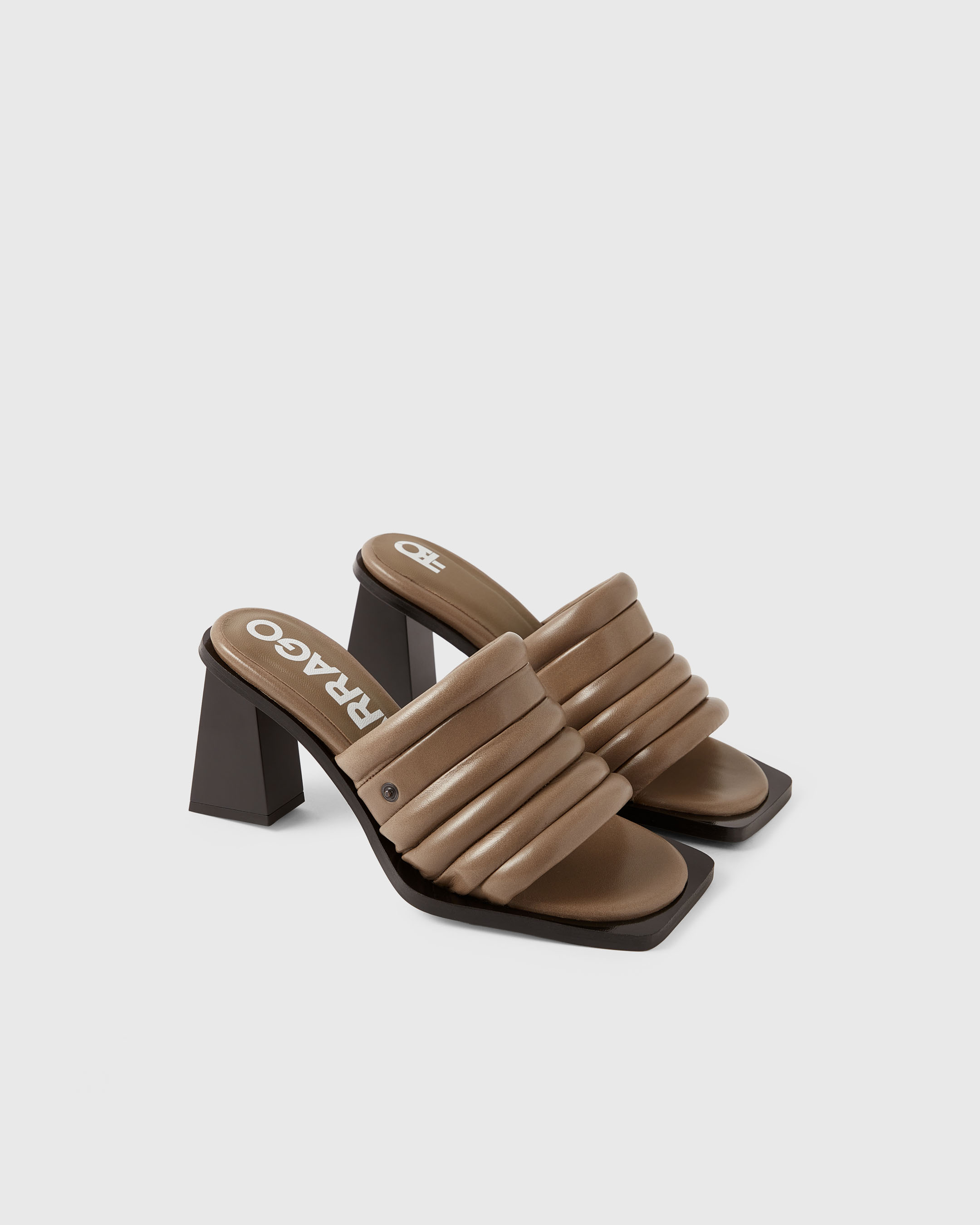 Product photography of a brown pair of Farrago mules