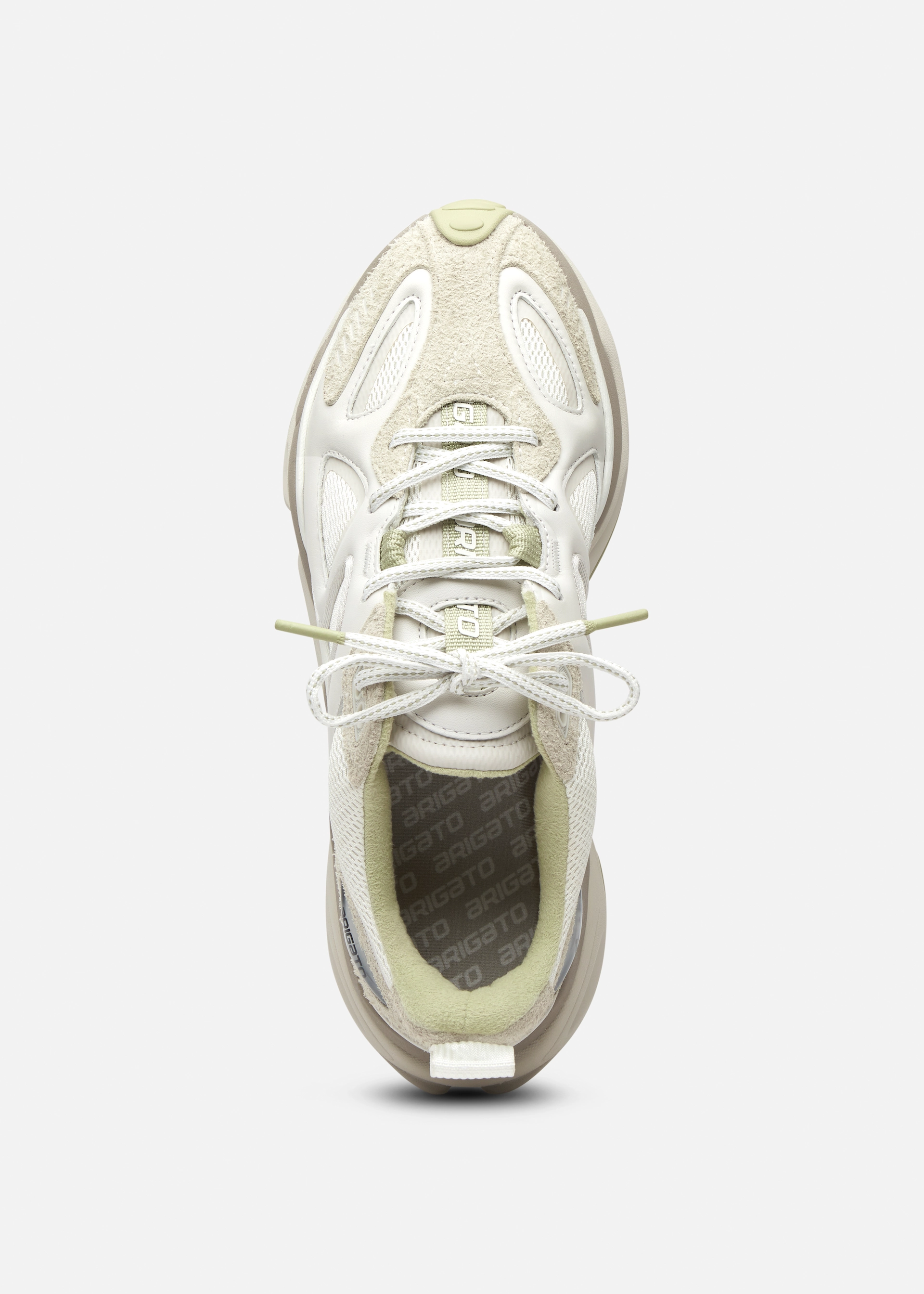 Top view of a beige and white Axel Arigato athletic sneaker with a tied lace and branded insole.