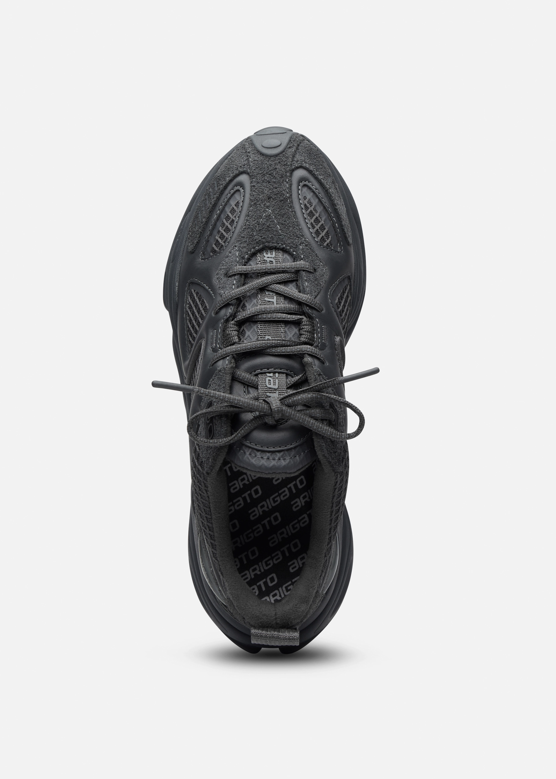 Top view of a black Axel Arigato sneaker with mesh and suede details and laces tied in a bow.