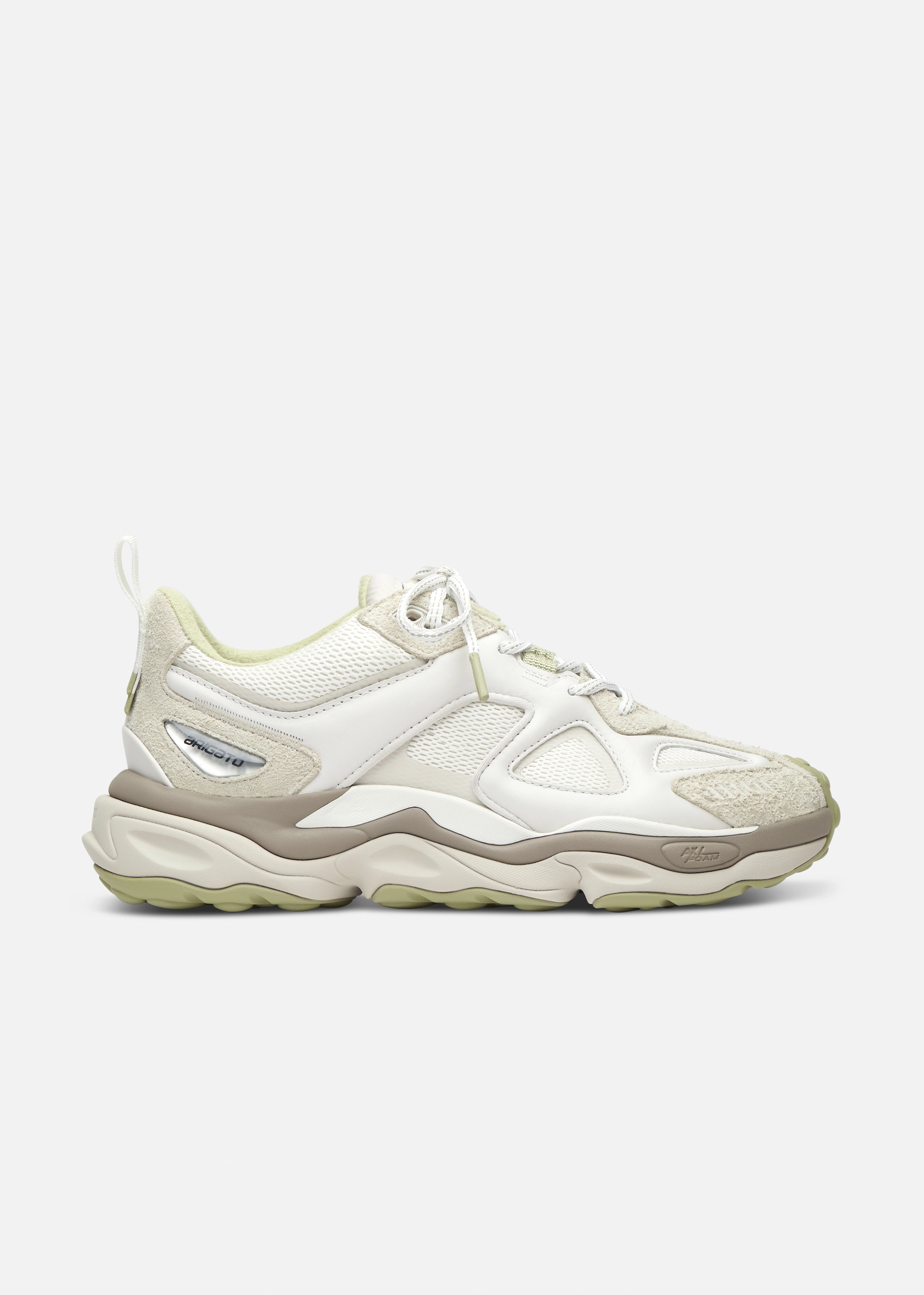 Side view of white and beige chunky Axel Arigato sneaker with textured sole and mesh and suede details.