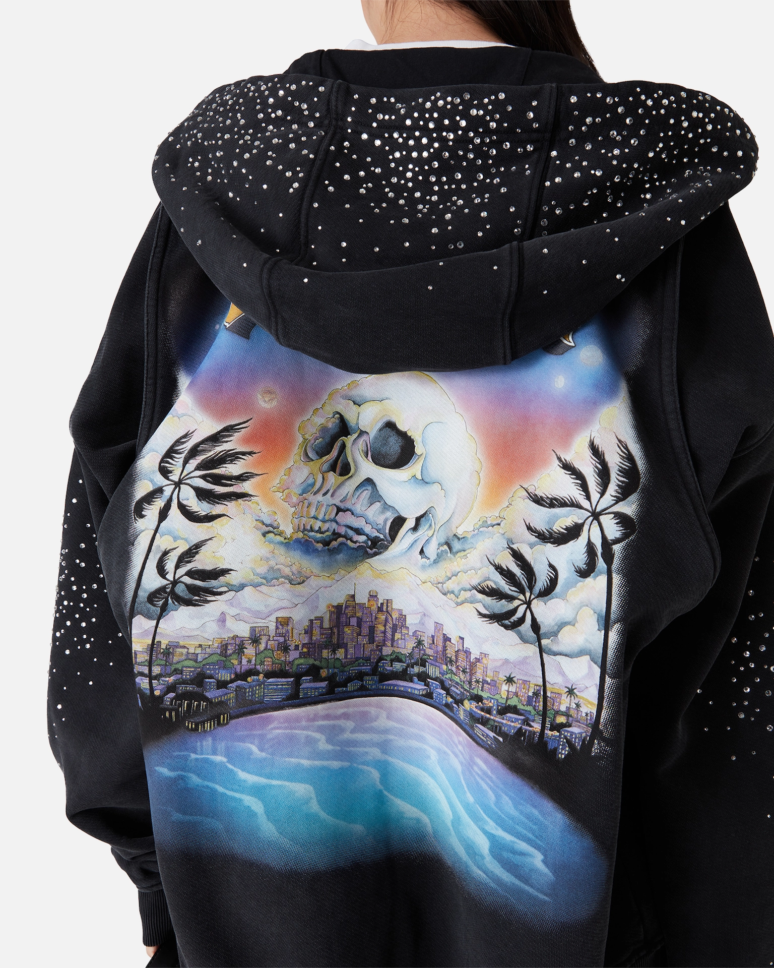 Casablanca Black hoodie with a large back print showing a skull in the sky over a cityscape with palm trees and water.