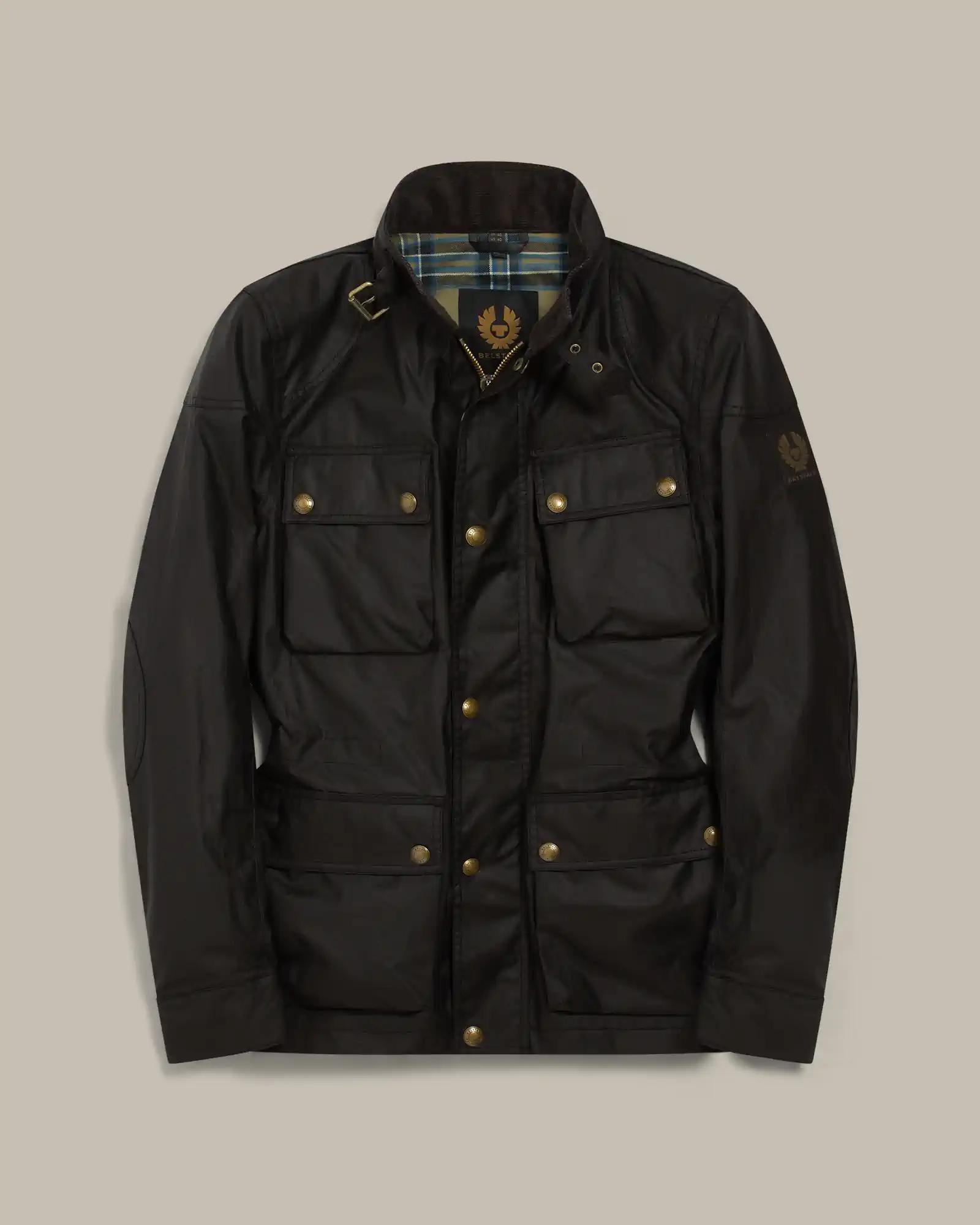 Black Belstaff jacket with four flap pockets and gold-tone snaps, featuring a buckled collar and plaid lining.