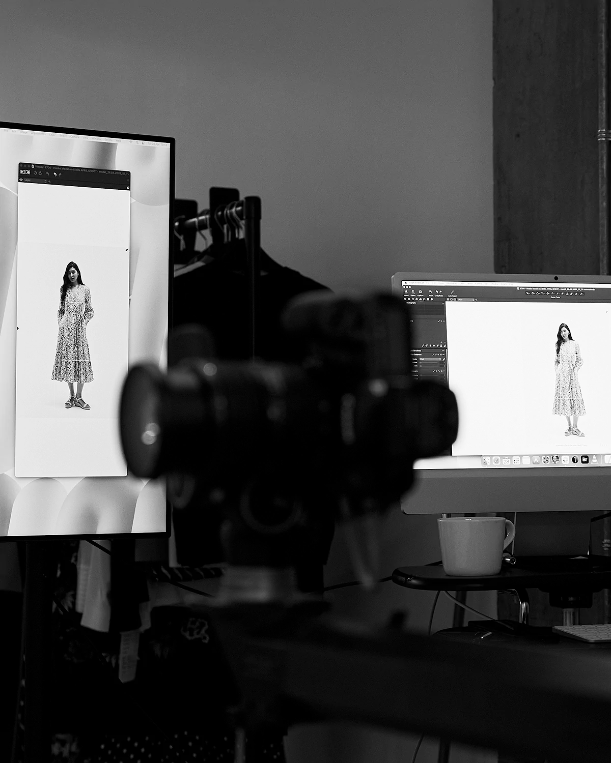 LRP e-Commerce Photography studio setup with two monitors showing a woman in a patterned dress and a camera in front.