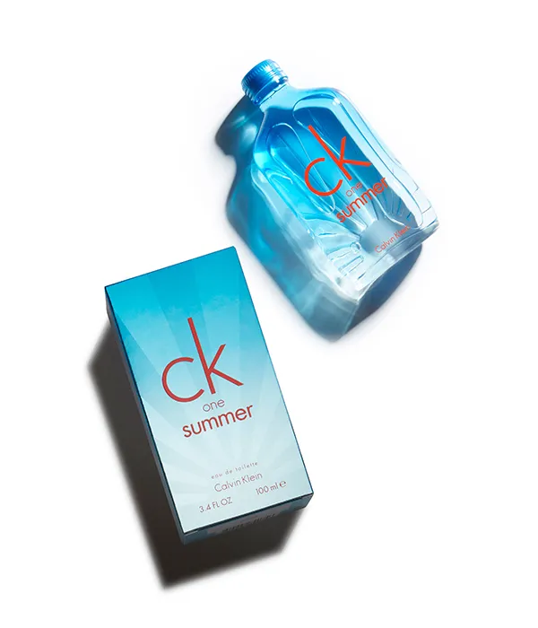 CK One Summer perfume bottle and matching blue box with orange text on white background.