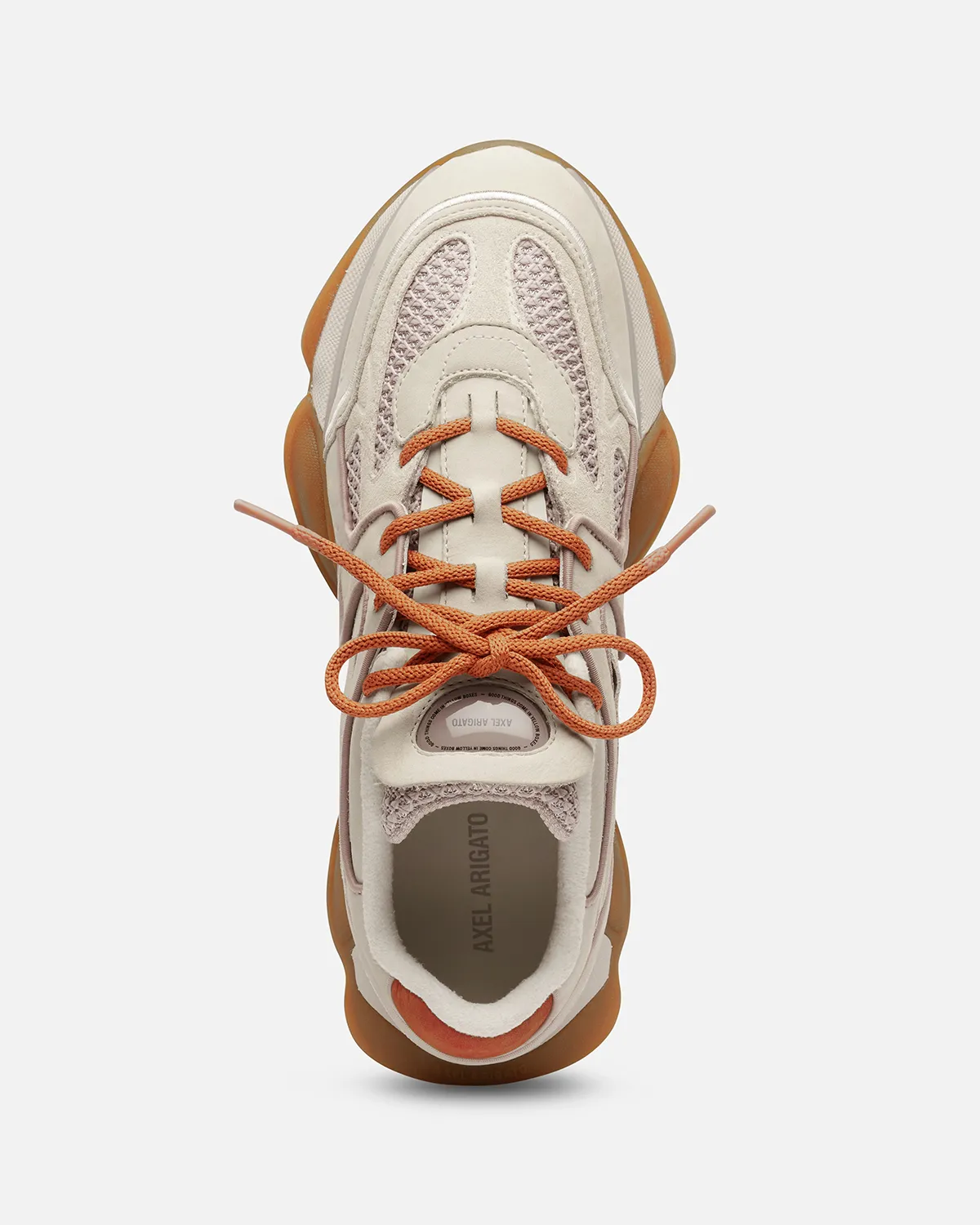 Top view of a beige and orange Axel Arigato sneaker with orange laces and a gum sole.