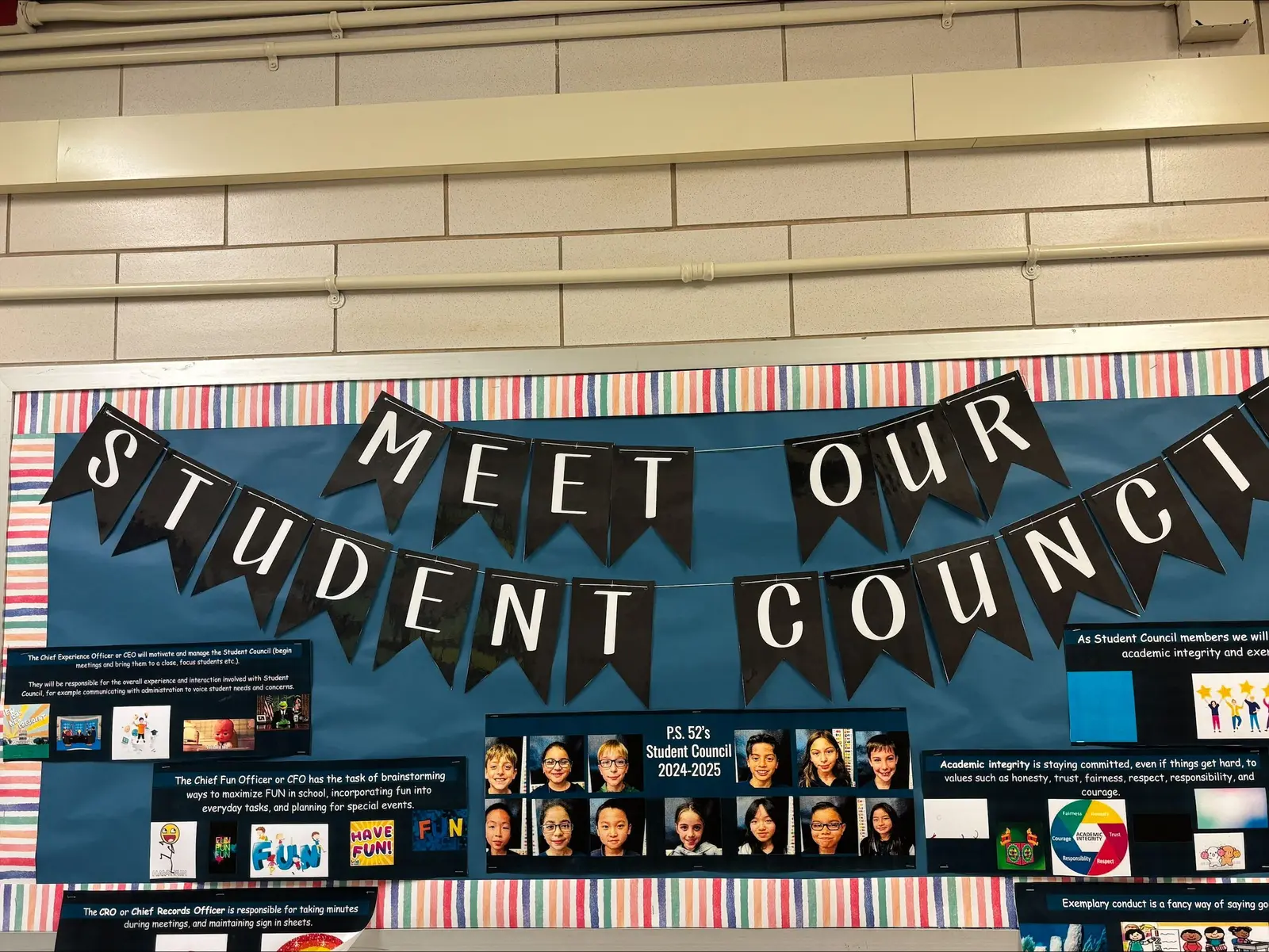 PS 52 Student Council 2024-2025 bulletin board with member photos