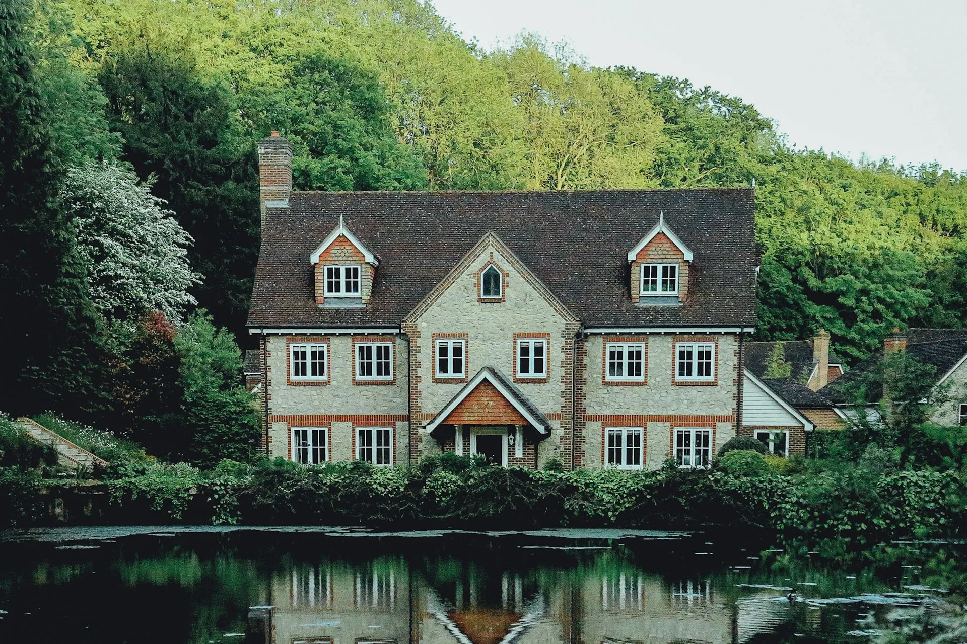 A traditional estate home with classic architecture, representing the generational wealth and legacy planning services at Sears Group.