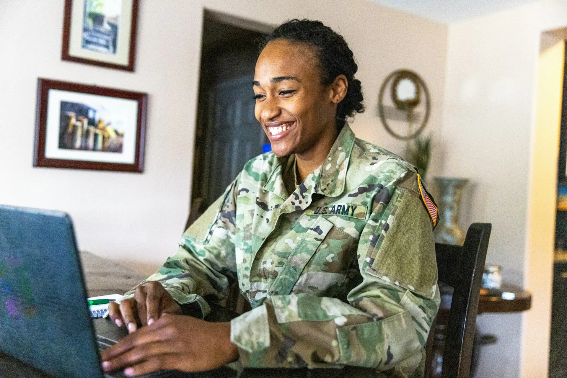 A military service member in uniform, representing the veteran and service member clients Sears Group proudly serves.