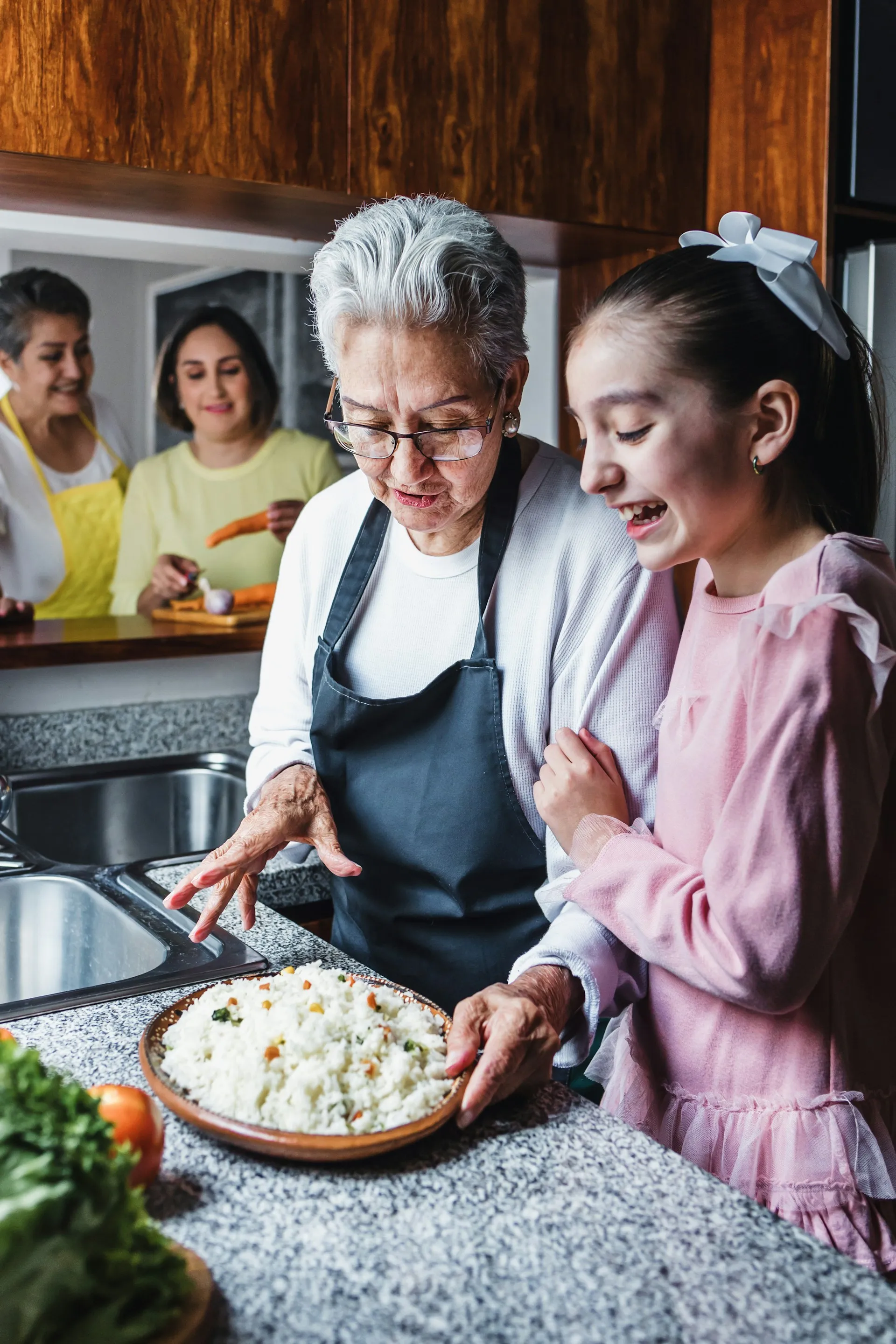 A grandmother and grandchild sharing a joyful moment, representing the multi-generational impact of thoughtful estate planning.