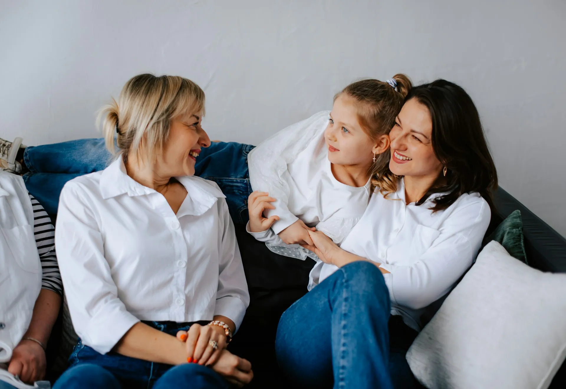 Three generations of women together, representing the enduring impact of thoughtful estate and legacy planning.