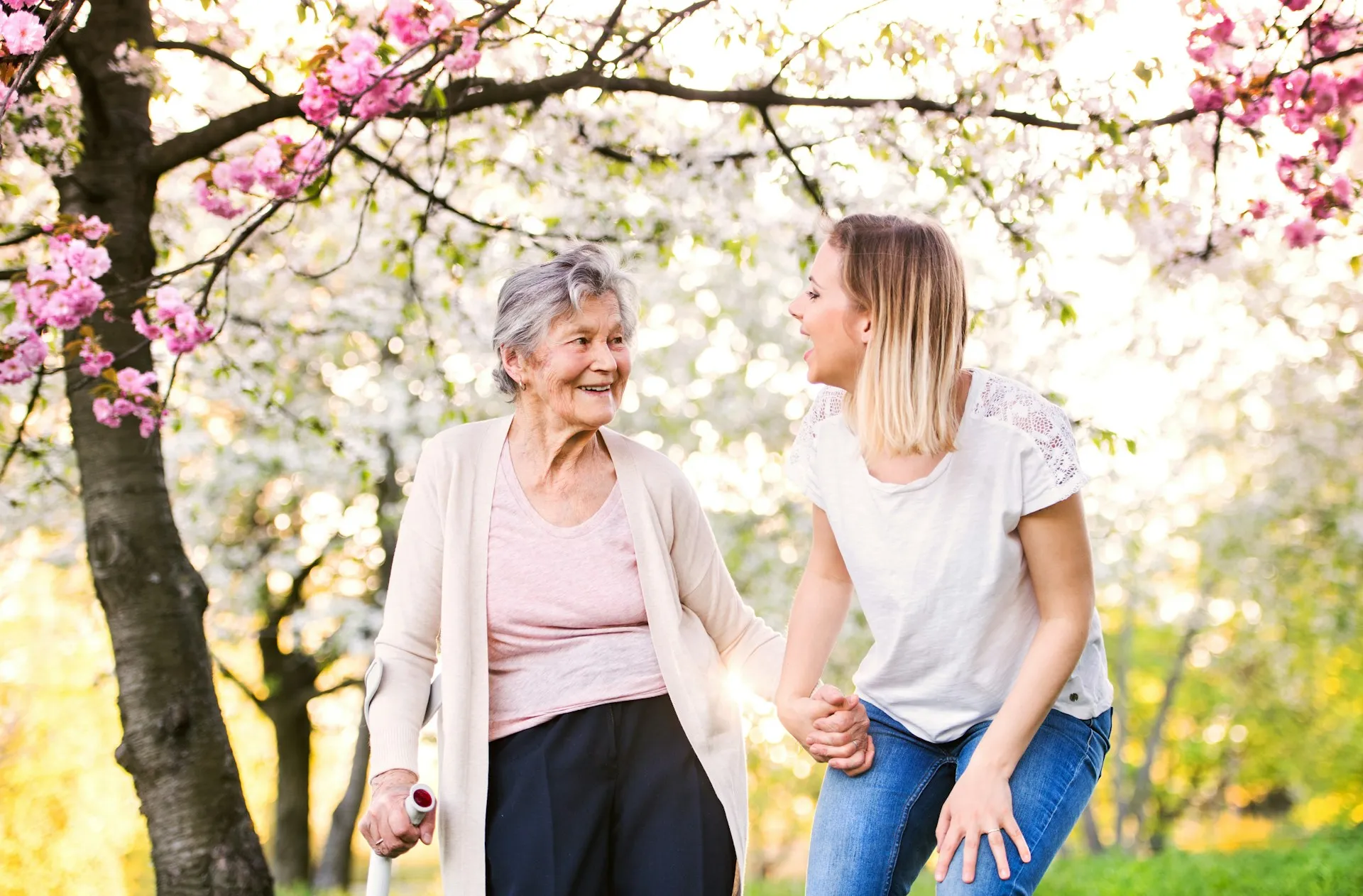 A grandmother and her daughter sharing a warm moment, representing multi-generational legacy planning.