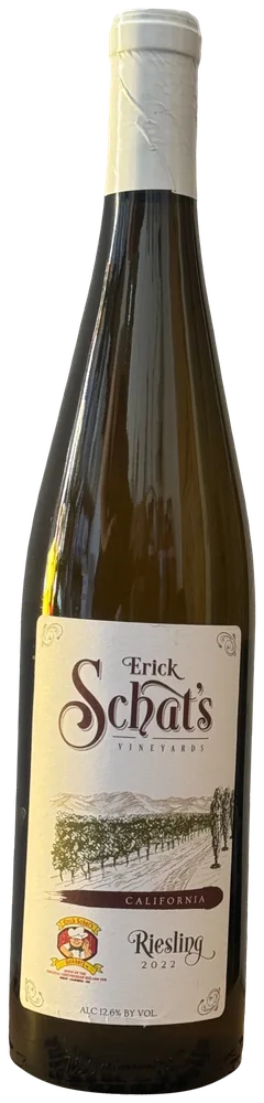 A dark glass wine bottle with a cream-colored cap, labeled Erick Schat's Vineyards Riesling 2022 from California, 12.6% alcohol by volume, featuring a vineyard illustration and a logo with a smiling baker.