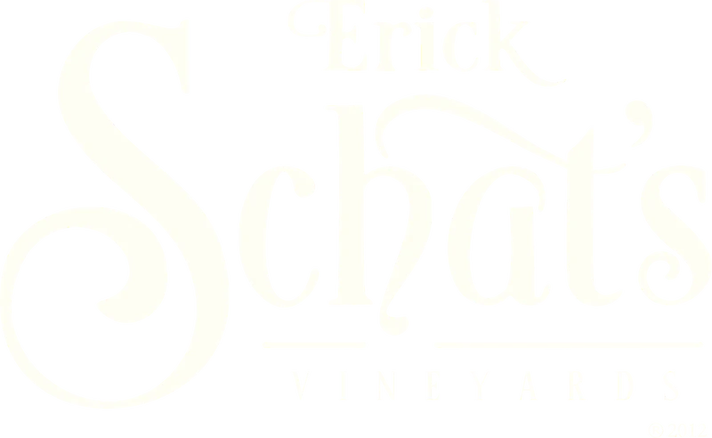 Logo with the text 'Six Cats Vineyards' in a stylized white font on a black background.