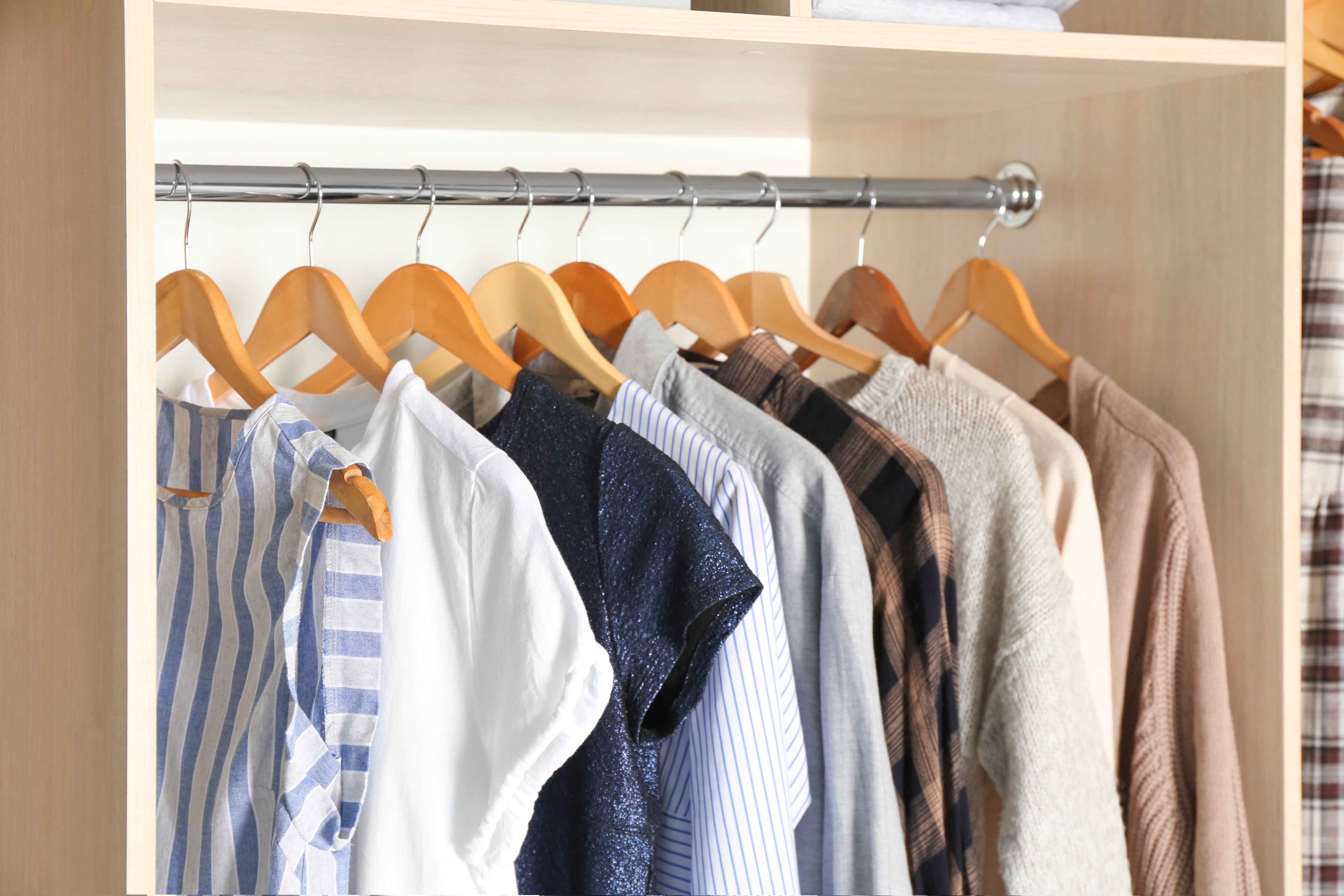 Clothes in a closet stock image