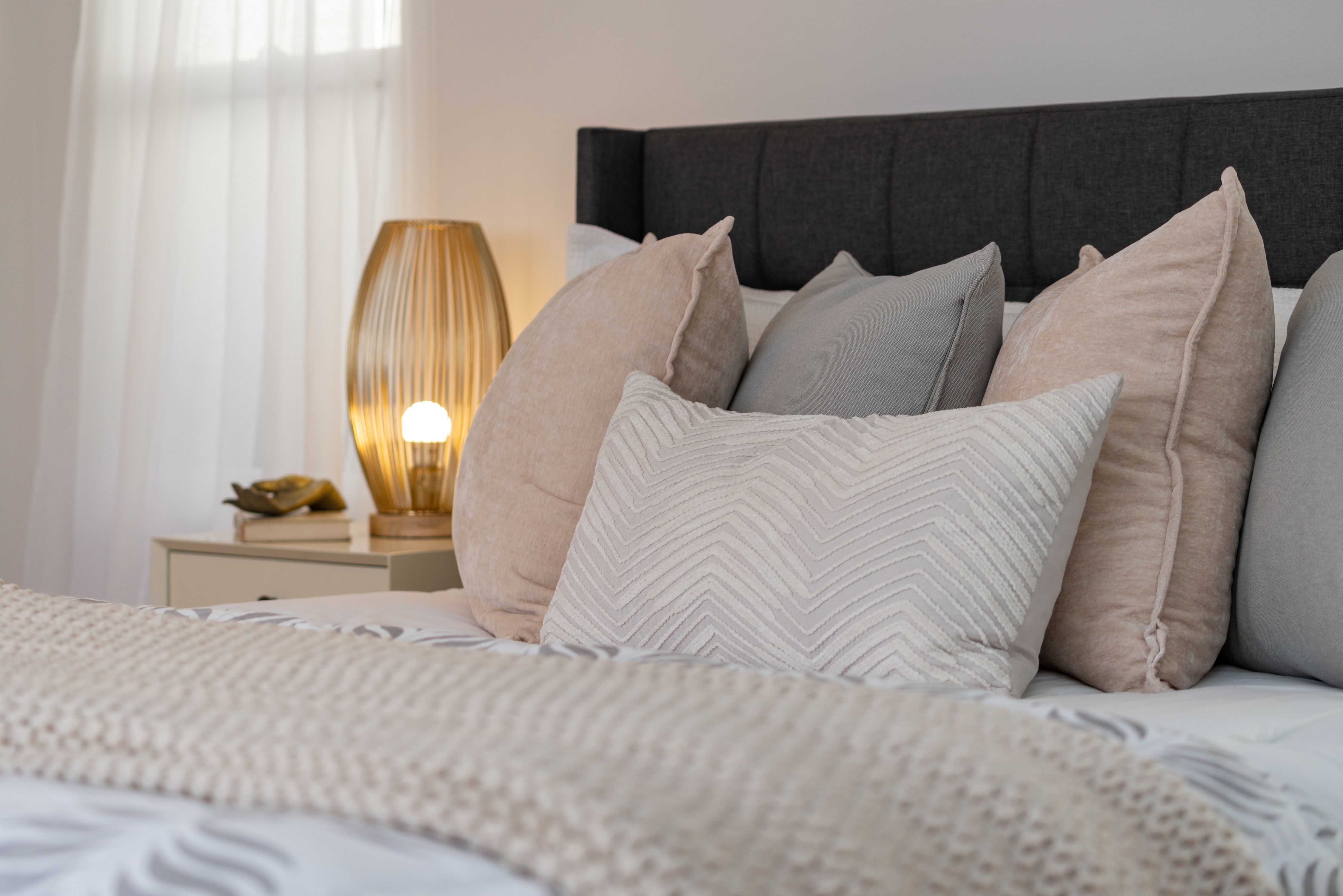 Bed with pillows stock image
