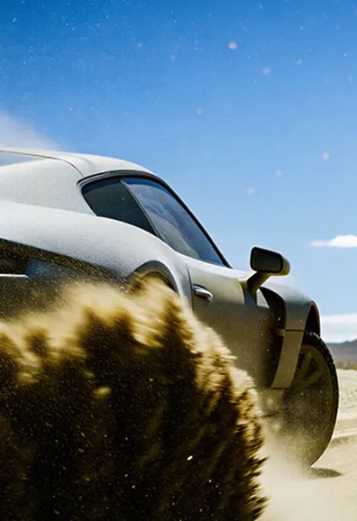 Car driving on a road with mountains in the background