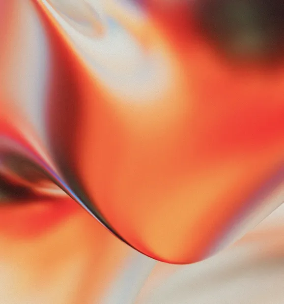 Abstract fluid gradient in warm orange, red, and coral tones