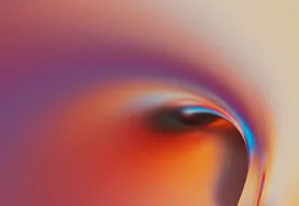 Abstract blurred gradient background with warm orange and red tones swirling into soft white light, with a subtle hint of purple in the lower left.
