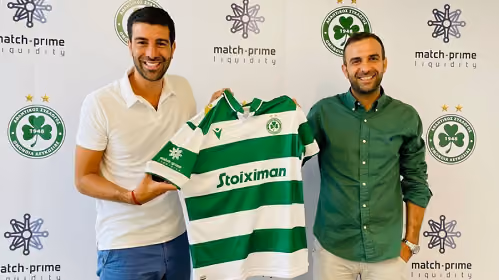 Two Match-Prime executives holding an Omonoia Nicosia football shirt