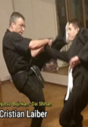 NKKF Instructor performs self defense with wrist lock and kick