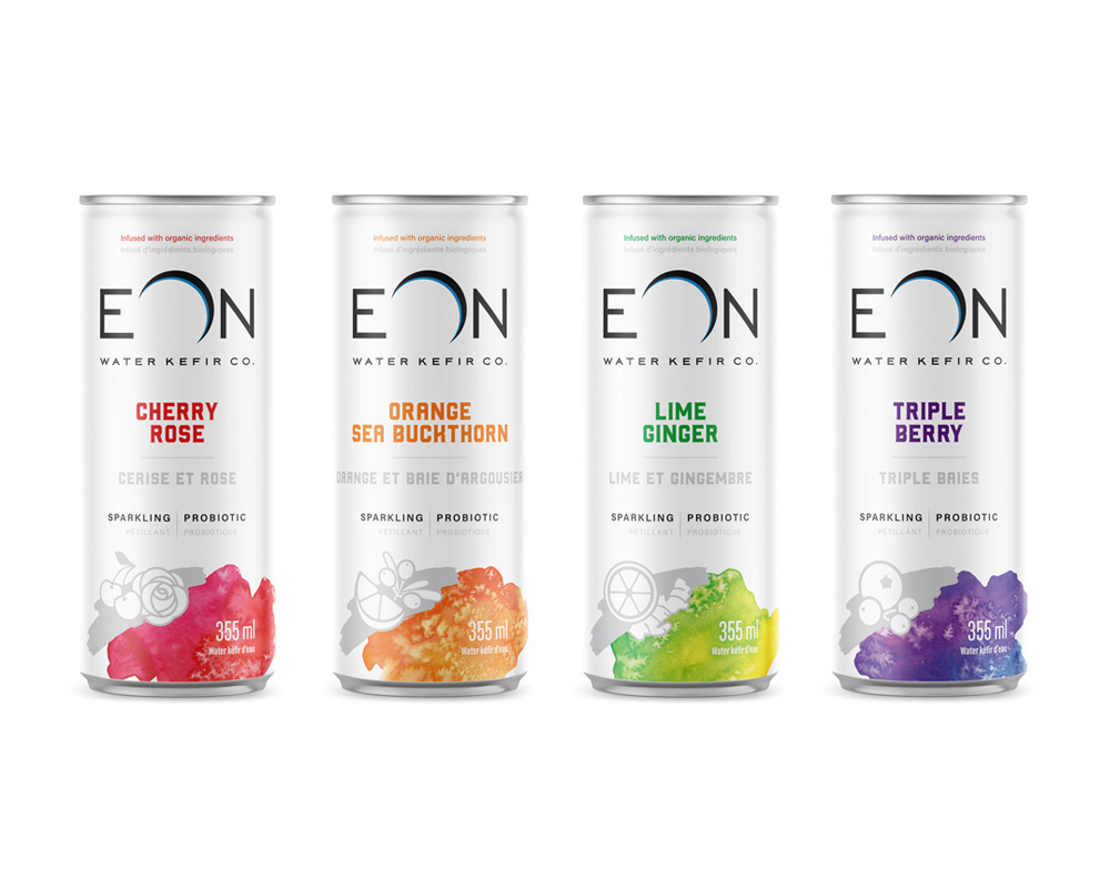 Four cans of EON Water Kefir Co. sparkling probiotic beverages, flavors from left to right: Cherry Rose in red, Orange Sea Buckthorn in orange, Lime Ginger in green, and Triple Berry in purple, each with corresponding color splash and ingredient icons at the bottom.
