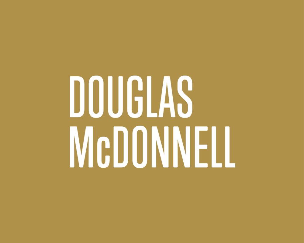 White text reading Douglas McDonnell on a solid brown background.