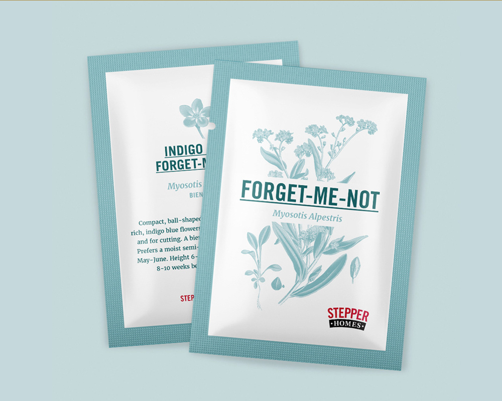 Two seed packets with blue borders labeled 'FORGET-ME-NOT Myosotis Alpestris' and 'INDIGO FORGET-ME-NOT Myosotis' featuring botanical illustrations of the flowers and planting information, branded with Stepper Homes.