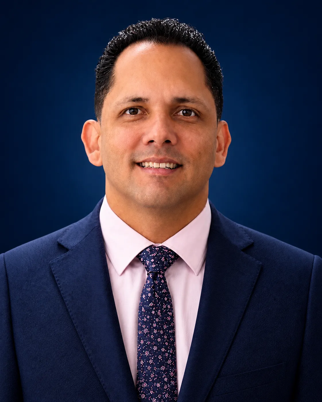 Dr. Gilberto Crespo — executive portrait