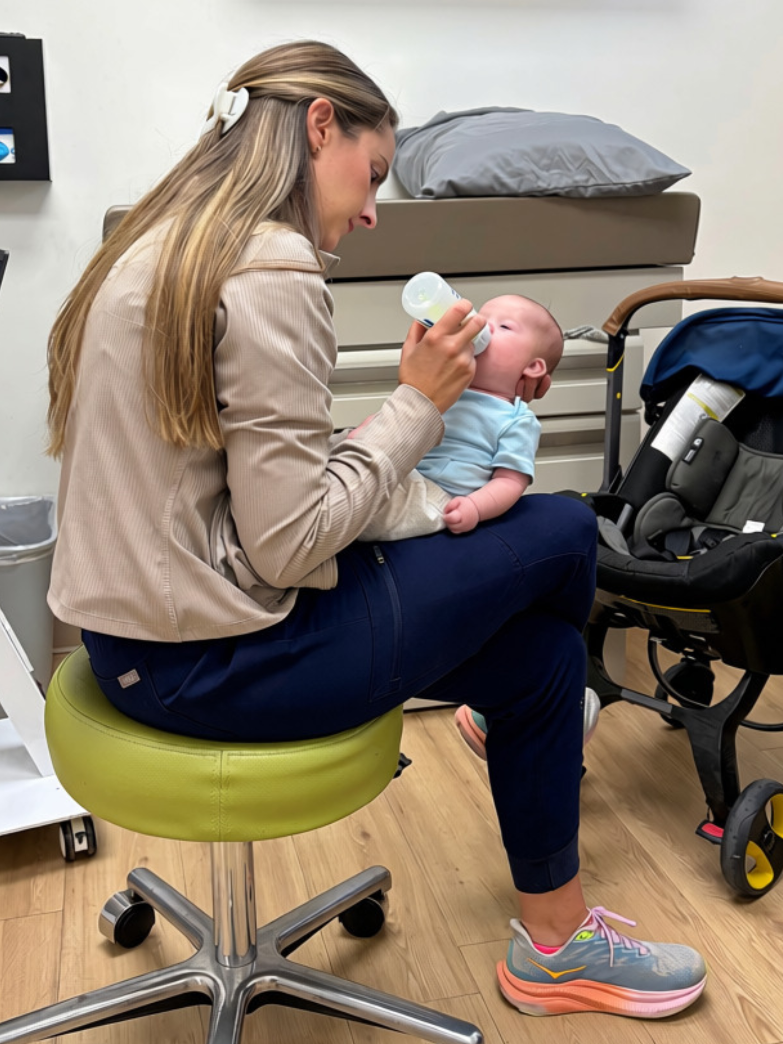 Parkview provider bottle-feeding an infant during a feeding assessment.