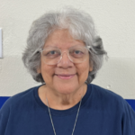 Tencha Rodriguez smiling staff member portrait photo