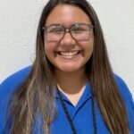 Jozlyn Munoz smiling staff member in blue shirt