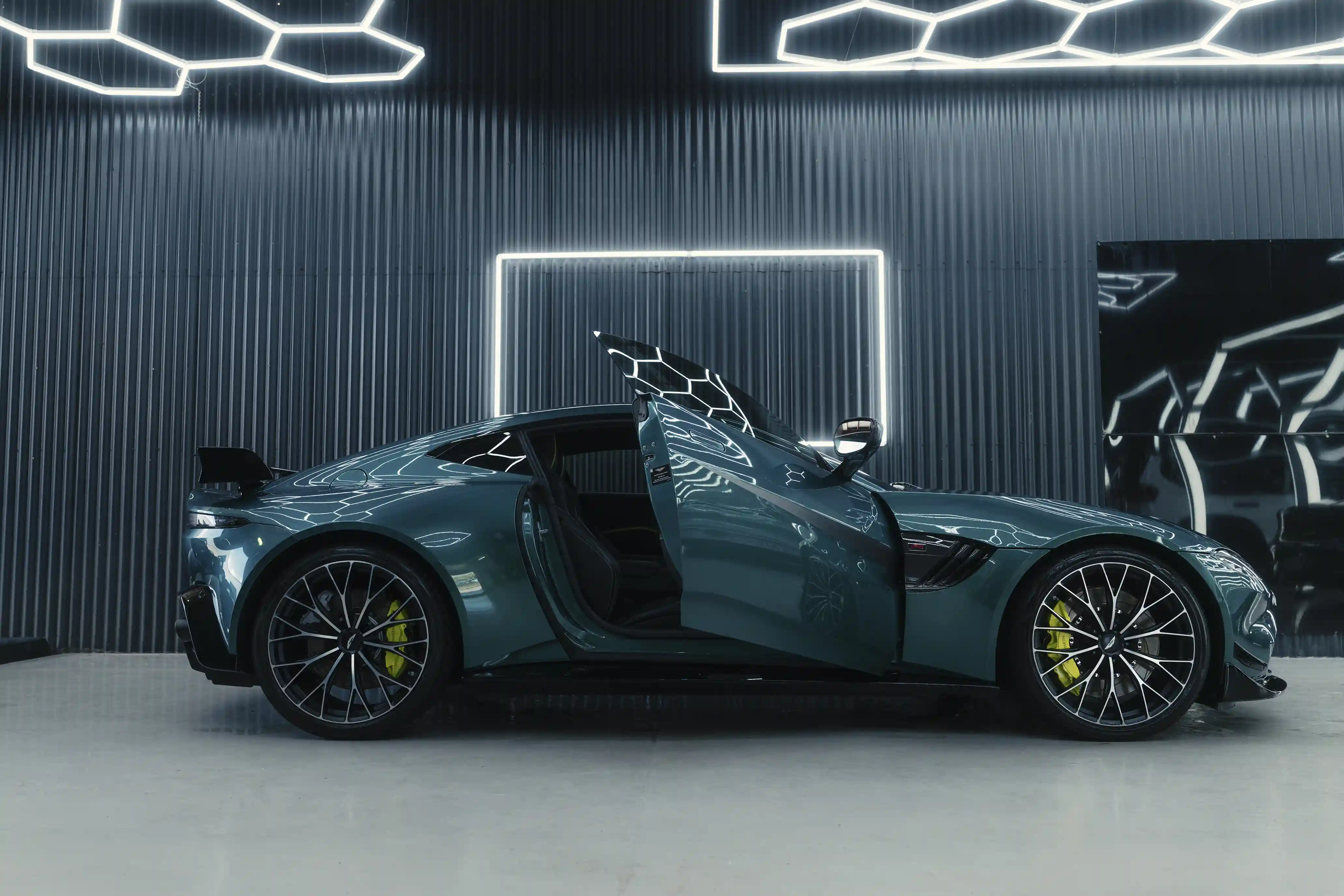 Aston Martin in the Ghostline Workshop under Paint Inspection Lights