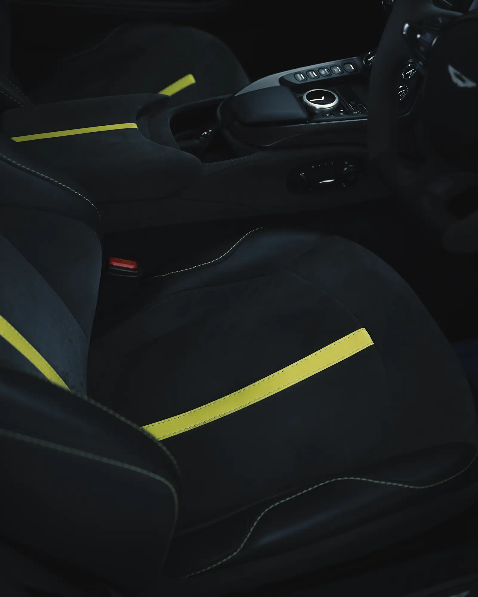 Freshly cleaned suede bucket seats in an Aston Martin