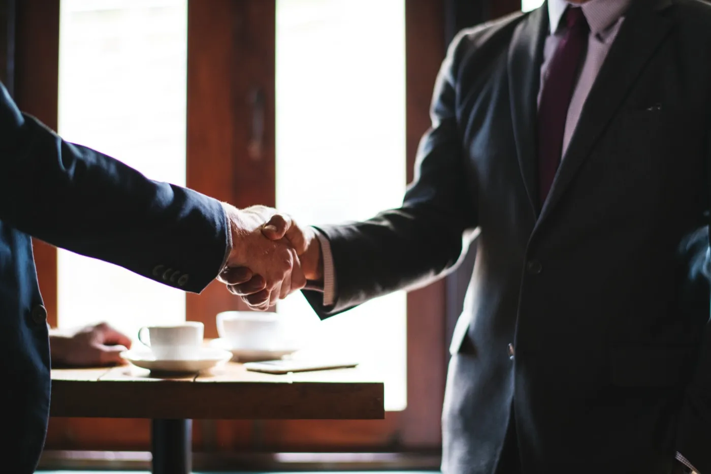 A handshake closing a new partnership